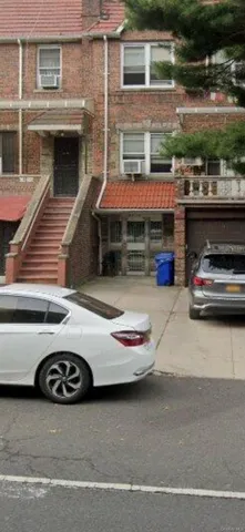 a car parked in front of a house