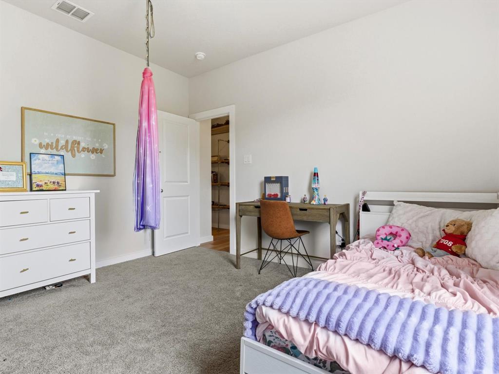 155 Rj Smith Drive Boyd, TX 76023 - Photo 25 of 37 Additional bedroom ideal for guests, family, or flexible use.