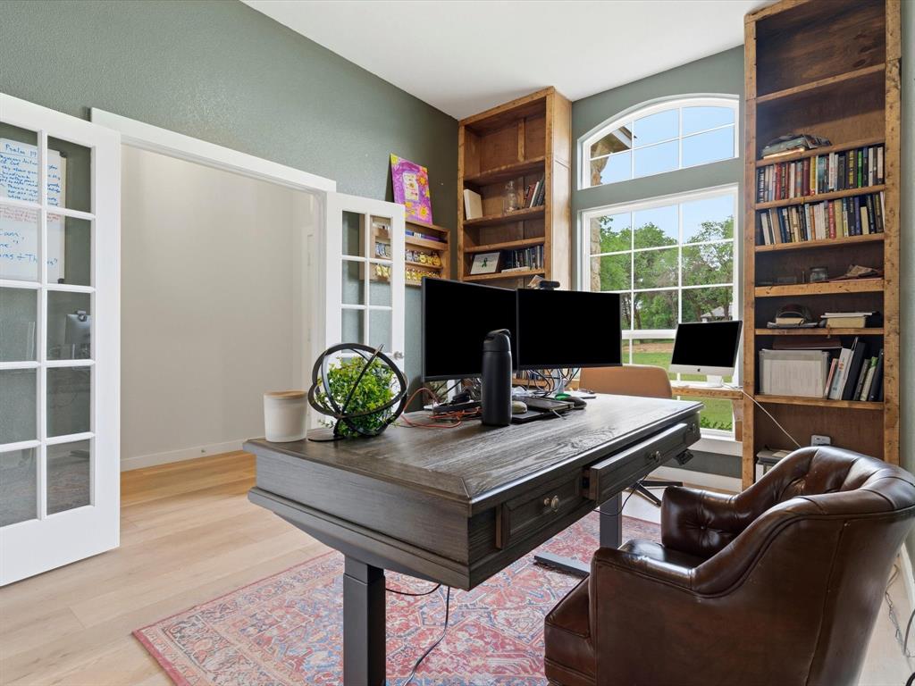 155 Rj Smith Drive Boyd, TX 76023 - Photo 5 of 37 Dedicated home office space, ideal for remote work or study.