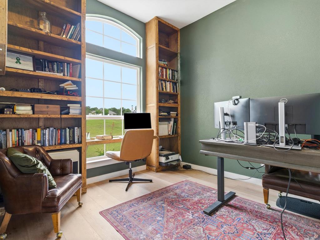 155 Rj Smith Drive Boyd, TX 76023 - Photo 6 of 37 Dedicated home office space, ideal for remote work or study.