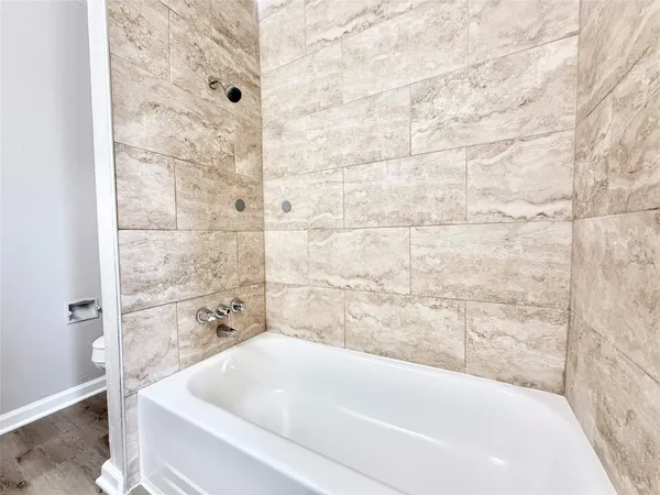 a bathroom with a bathtub