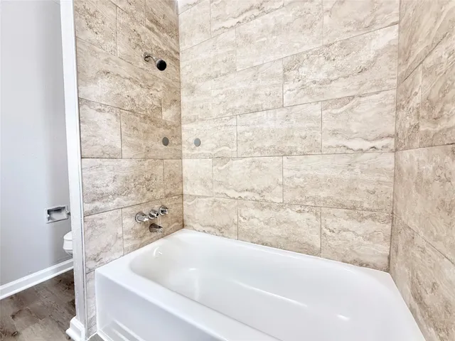 a bathroom with a bathtub