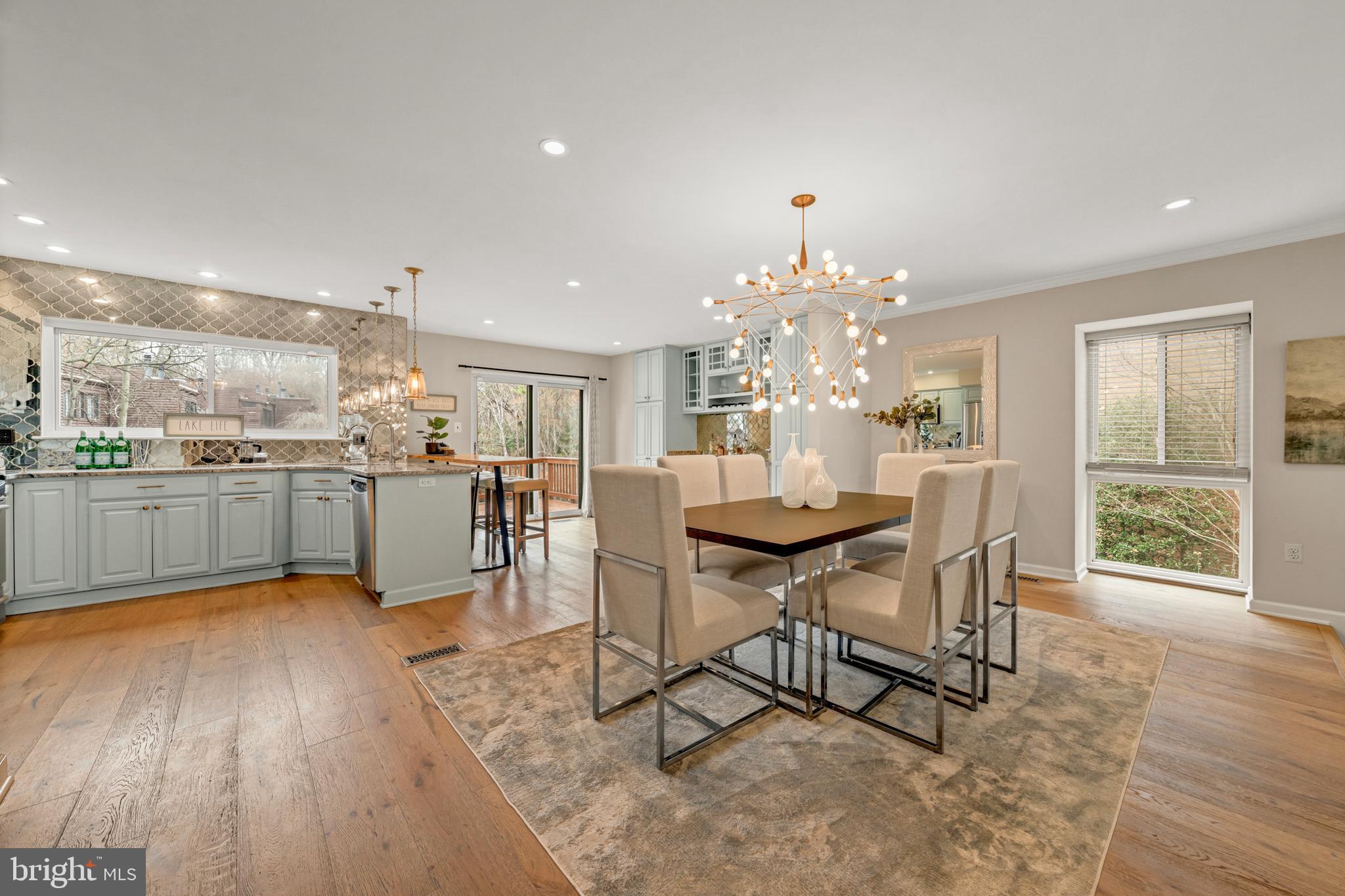 2012 Swans Neck Way Reston, VA 20191 - Photo 11 of 48 a room with stainless steel appliances kitchen island granite countertop furniture and a kitchen view