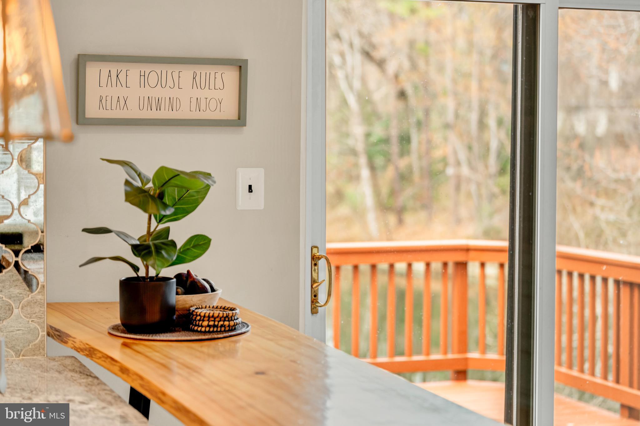 2012 Swans Neck Way Reston, VA 20191 - Photo 20 of 48 a view of a vase of flowers sitting on a table