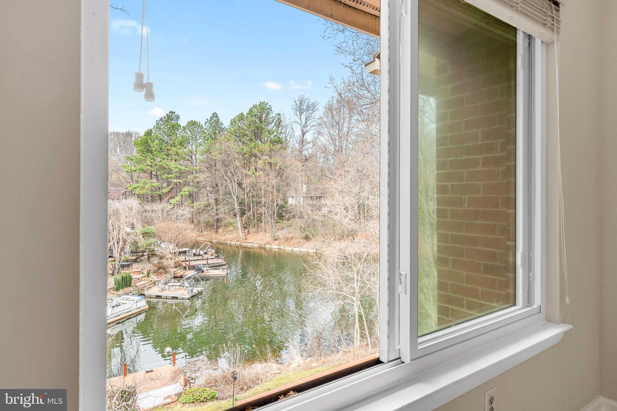 2012 Swans Neck Way Reston, VA 20191 - Photo 25 of 48 a bathroom with a glass door and a window