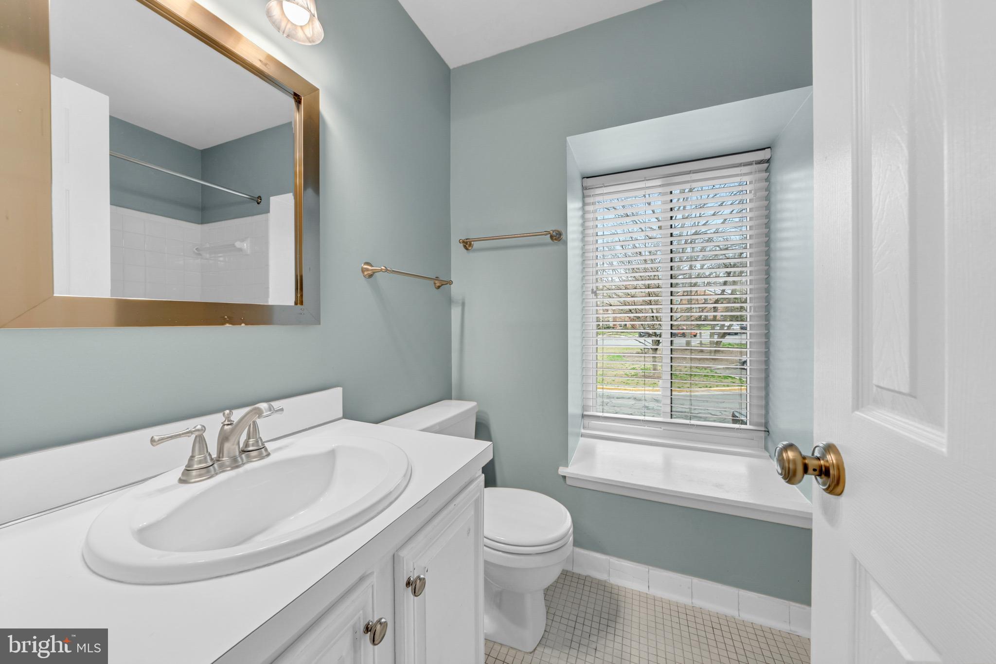 2012 Swans Neck Way Reston, VA 20191 - Photo 29 of 48 a bathroom with a sink toilet and tub