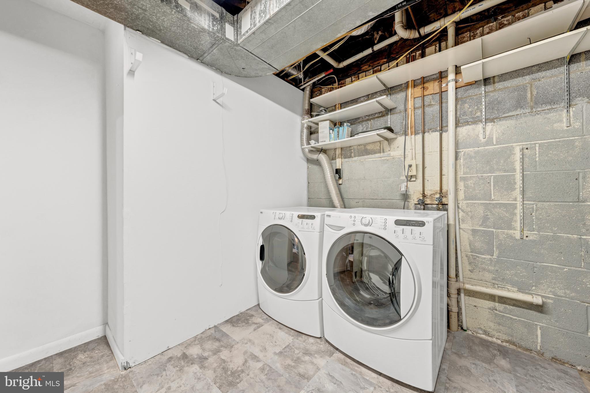 2012 Swans Neck Way Reston, VA 20191 - Photo 37 of 48 a utility room with dryer and washer