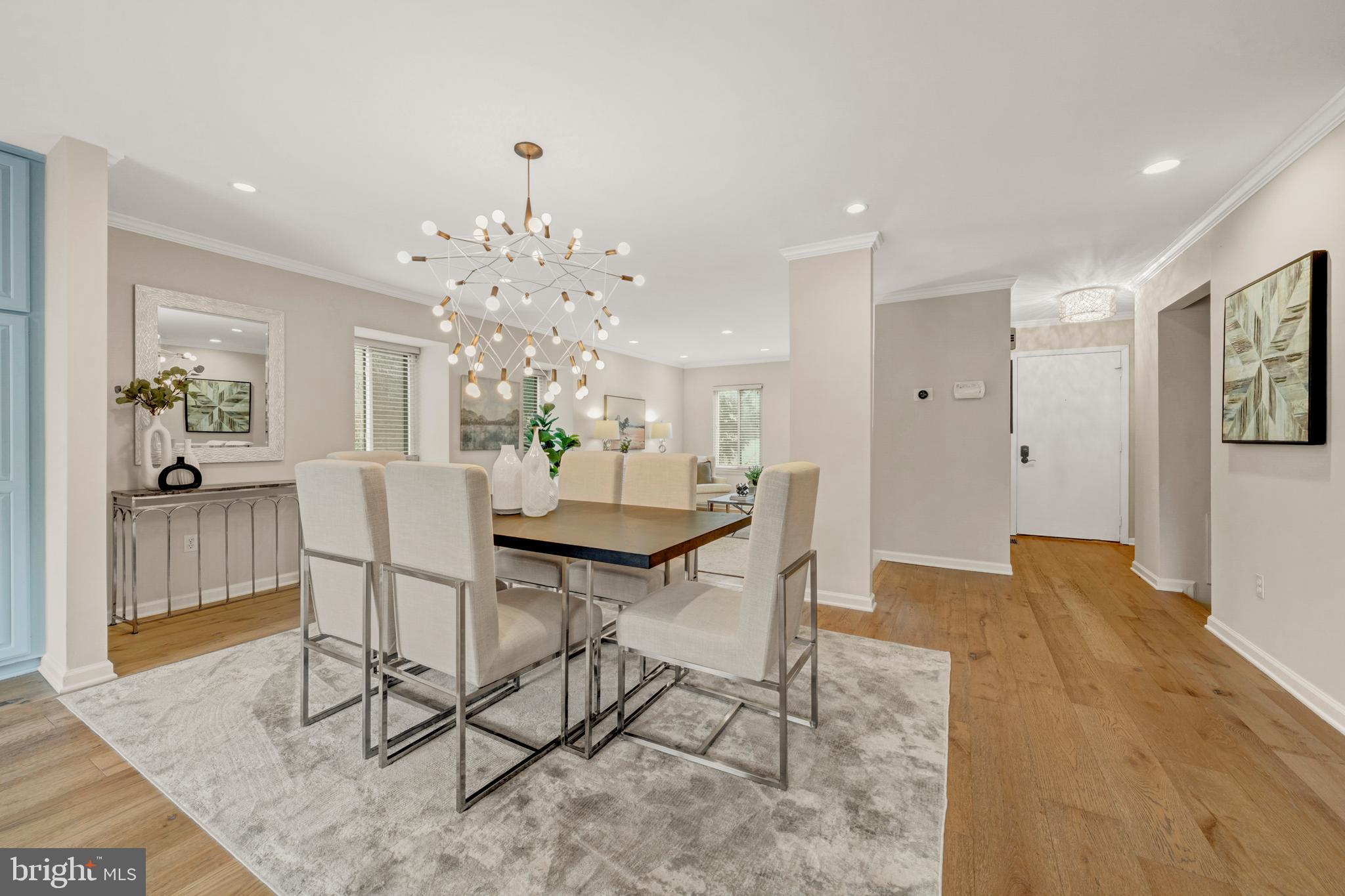 2012 Swans Neck Way Reston, VA 20191 - Photo 9 of 48 a view of a dining room with furniture and wooden floor