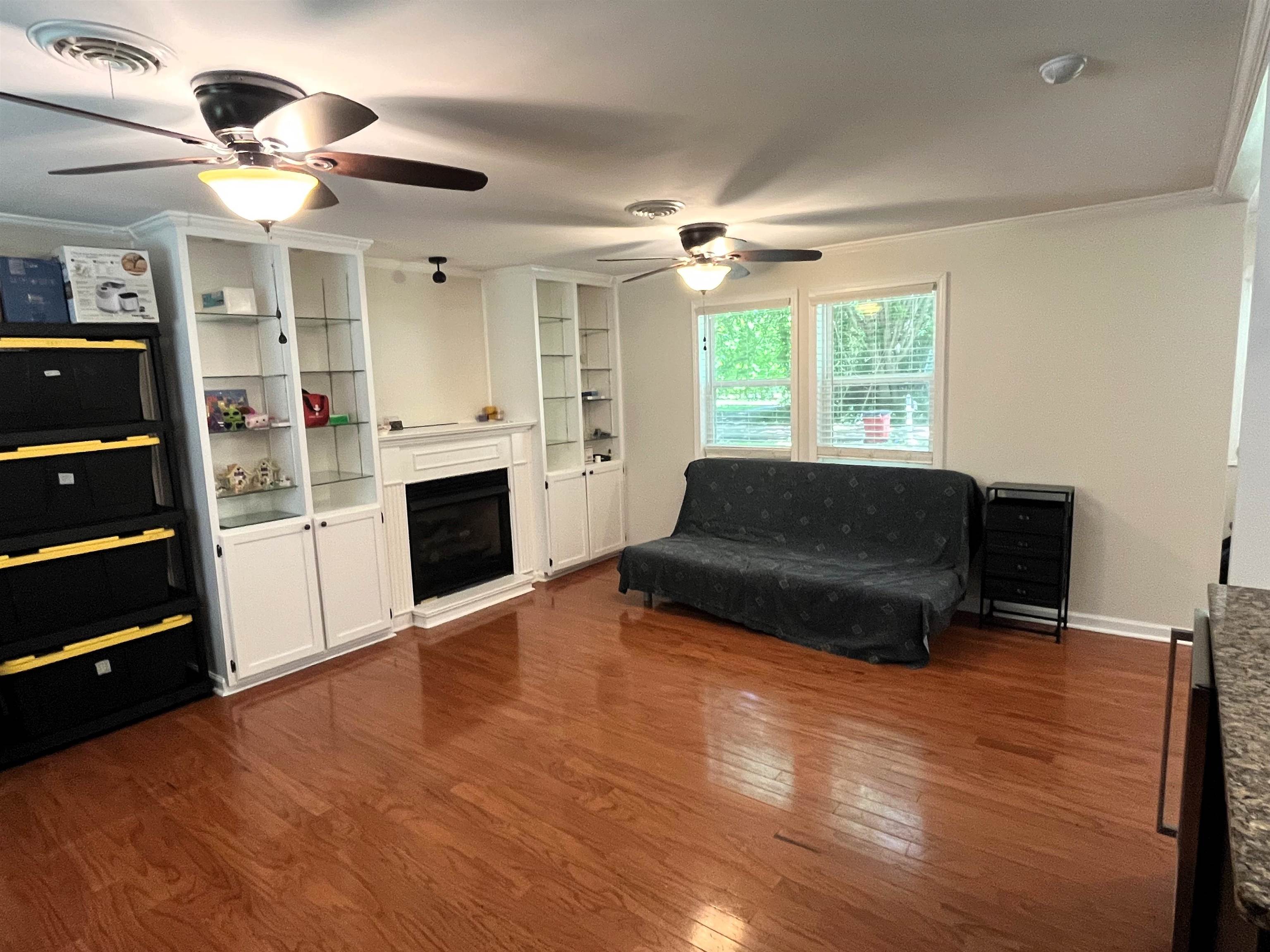 7835 Captain Road Millington, TN 38053 - Photo 11 of 24 a living room with furniture and a fireplace