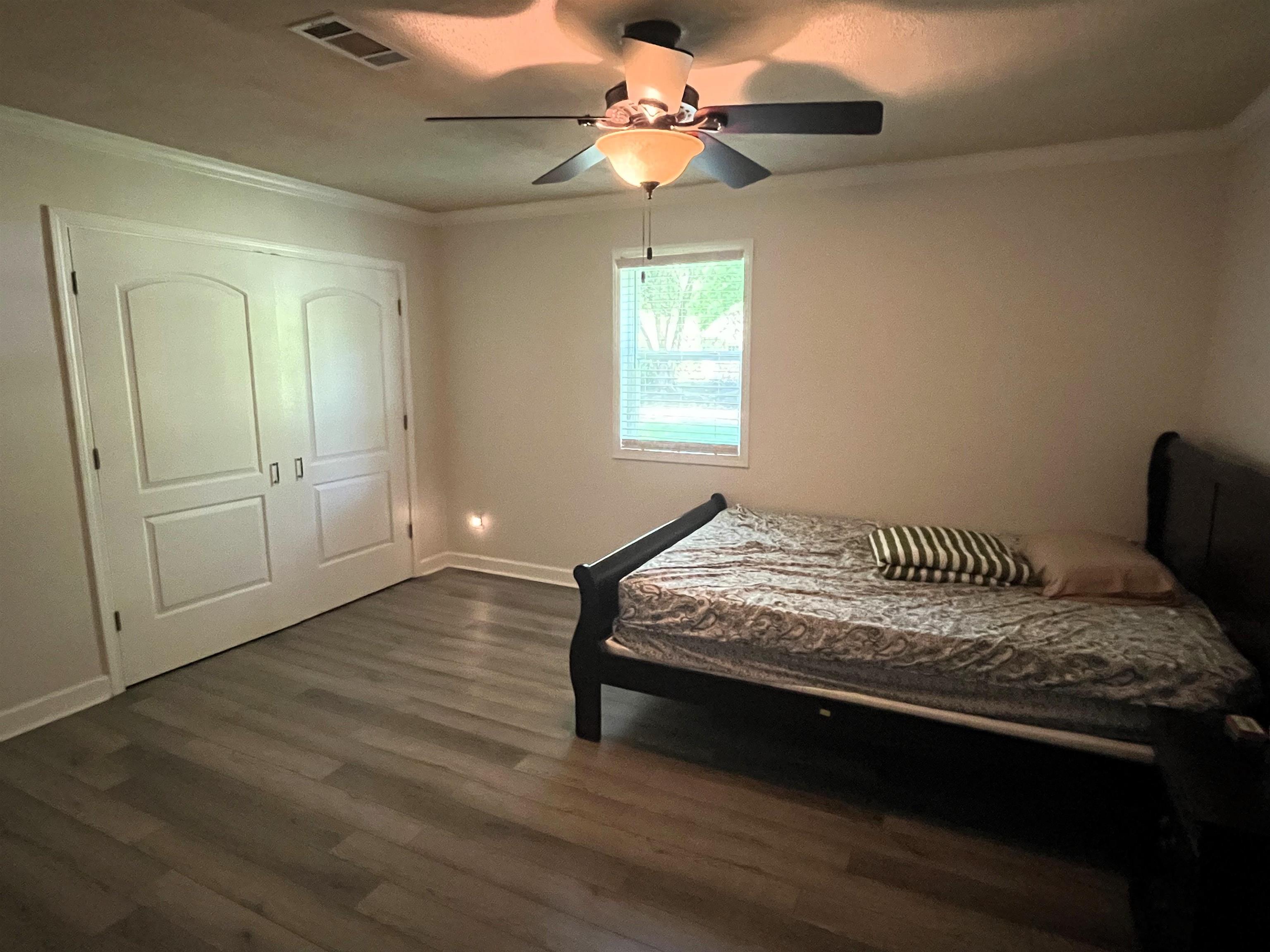 7835 Captain Road Millington, TN 38053 - Photo 15 of 24 a bedroom with a bed and a window