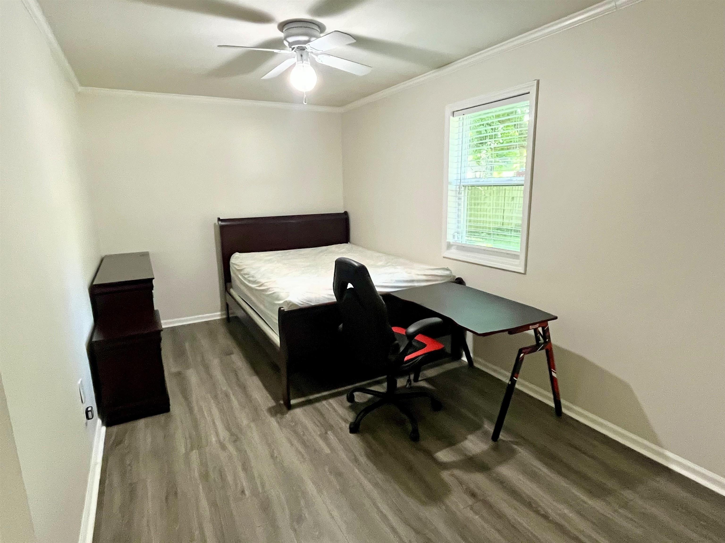 7835 Captain Road Millington, TN 38053 - Photo 18 of 24 a living room with furniture and a wooden floor