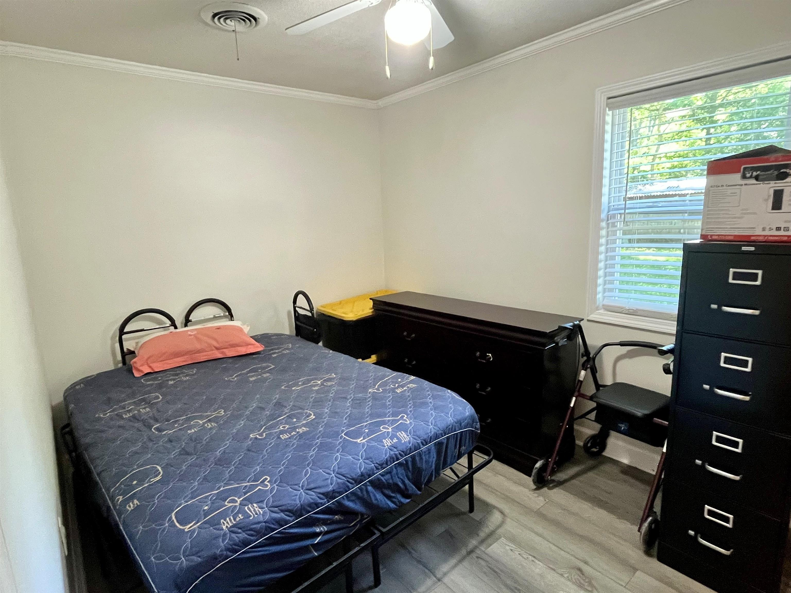 7835 Captain Road Millington, TN 38053 - Photo 19 of 24 a bedroom with a bed and a window