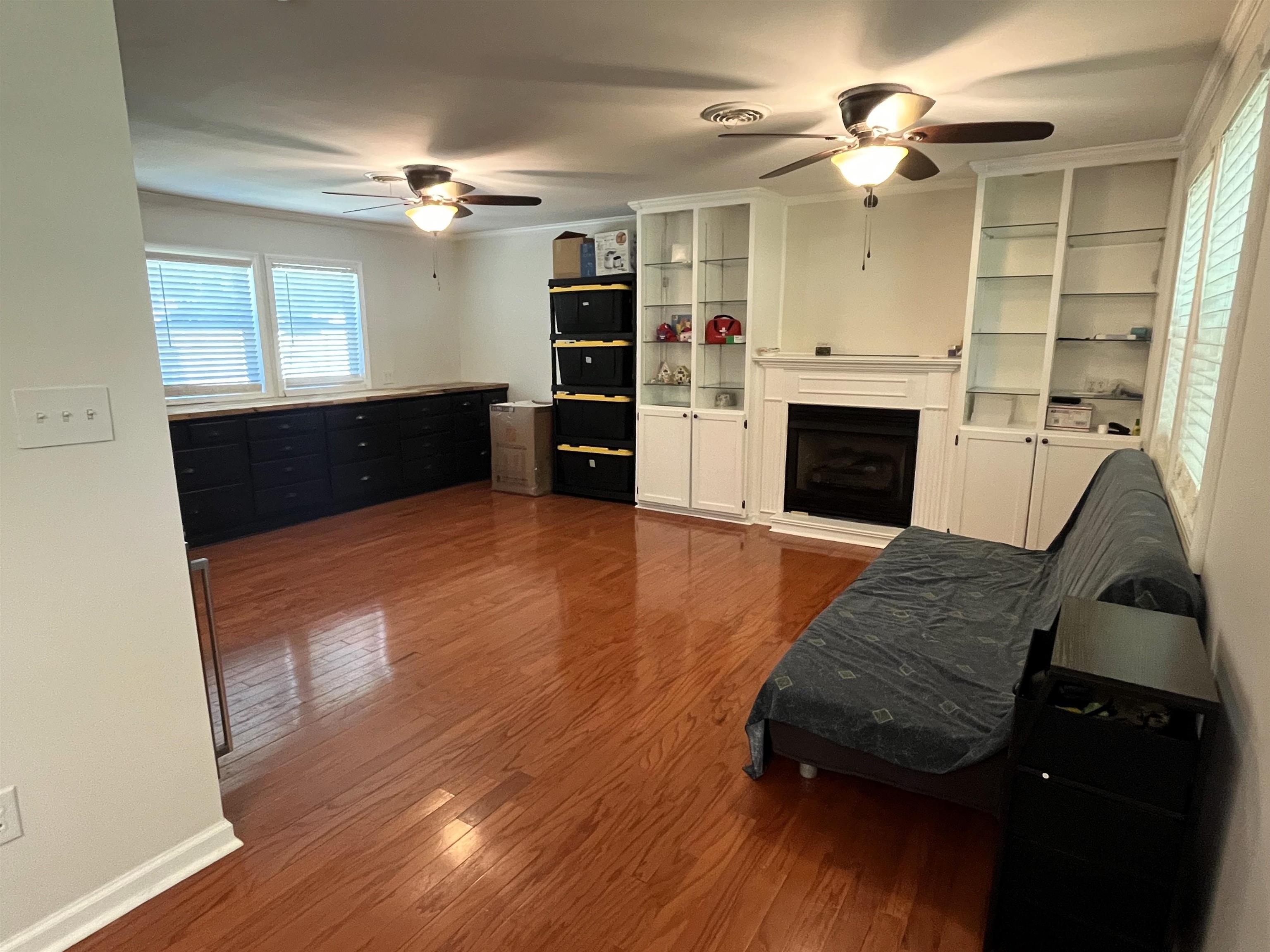 7835 Captain Road Millington, TN 38053 - Photo 10 of 24 a living room with furniture and a fireplace