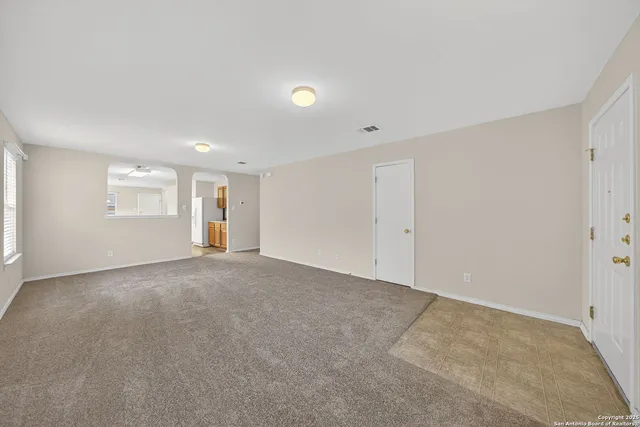 an empty room with windows