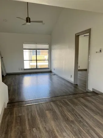 a kitchen with stainless steel appliances a refrigerator and a stove top oven