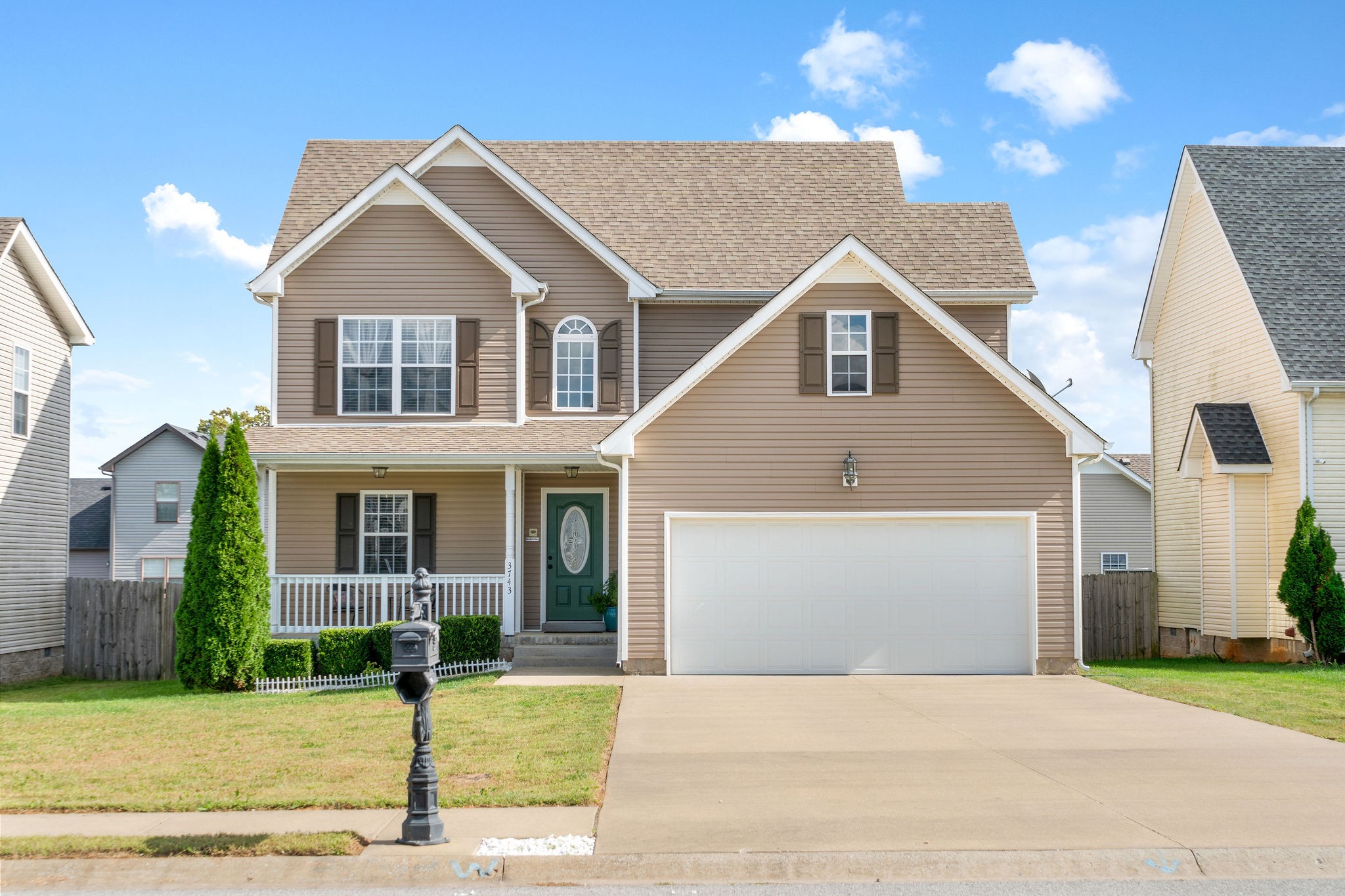 3743 Suiter Road Clarksville, TN 37040 - Photo 1 of 32 a front view of a house with a yard