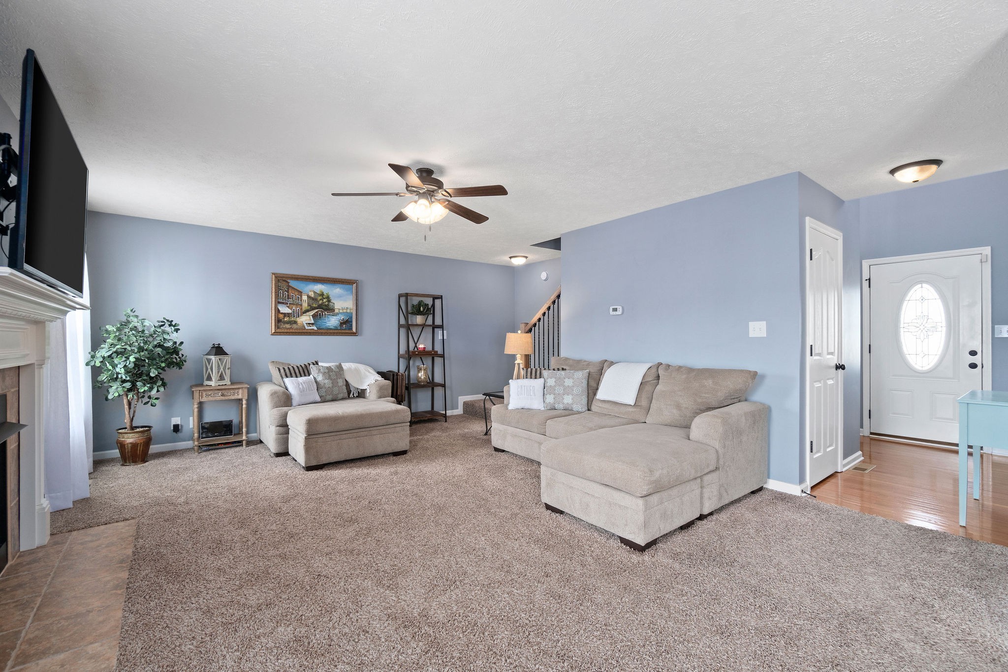 3743 Suiter Road Clarksville, TN 37040 - Photo 9 of 32 a living room with furniture and a chandelier