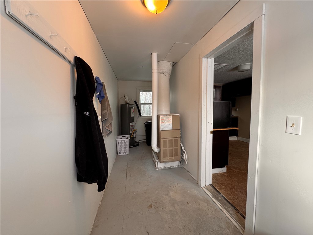 74 Sherman Street Bradford, PA 16701 - Photo 8 of 21 Rear foyer with heating system and hot water tank