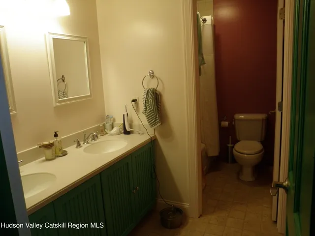 a view of a balcony with furniture and stairs