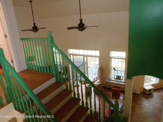 a view of balcony with wooden floor