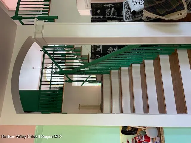 a living room with furniture and a gate