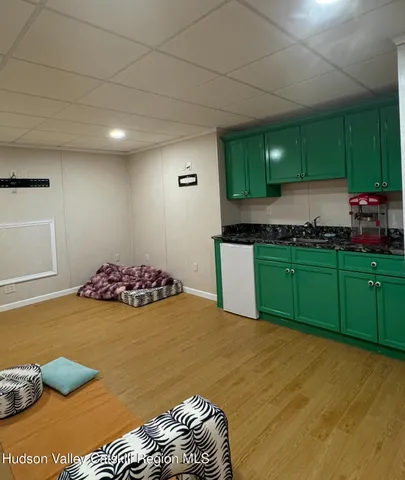 a view of an entryway with a front door