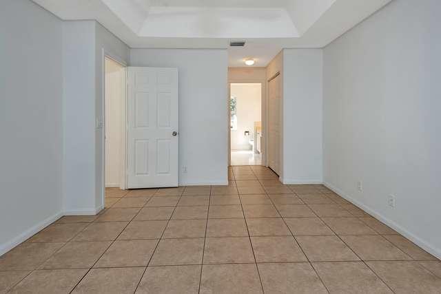 4821 North Lee Road Delray Beach, FL 33445 - Photo 14 of 33 a view of an empty room and window
