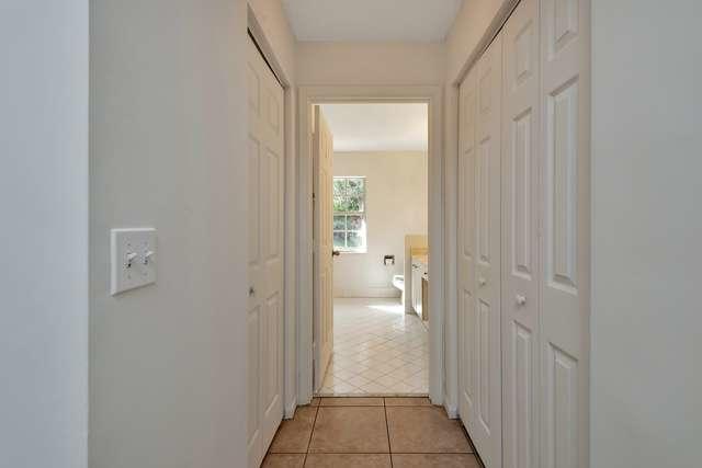 4821 North Lee Road Delray Beach, FL 33445 - Photo 16 of 33 a view of a bathroom from a hallway