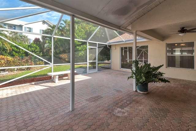 4821 North Lee Road Delray Beach, FL 33445 - Photo 28 of 33 a view of a house with porch and sitting area