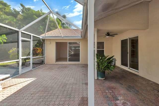 4821 North Lee Road Delray Beach, FL 33445 - Photo 30 of 33 a house view with a outdoor space