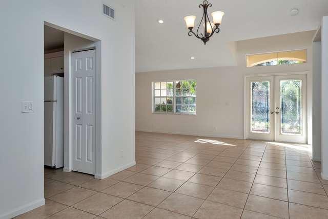 4821 North Lee Road Delray Beach, FL 33445 - Photo 3 of 33 a view of an empty room and window