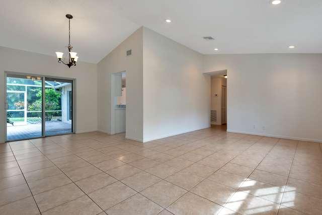4821 North Lee Road Delray Beach, FL 33445 - Photo 6 of 33 a view of a livingroom with a chandelier