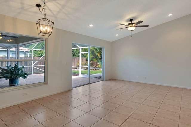 4821 North Lee Road Delray Beach, FL 33445 - Photo 8 of 33 a view of an empty room with a window