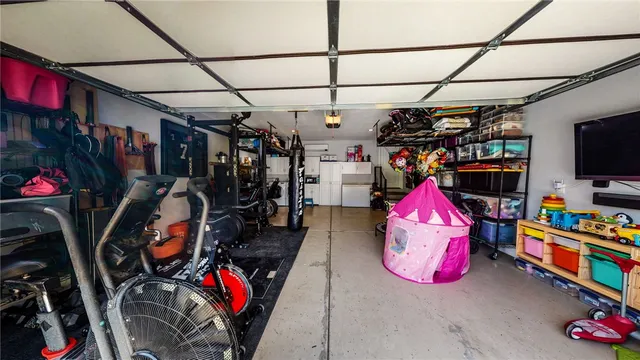 a view of a garage with storage