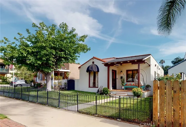 front view of a house with a small yard
