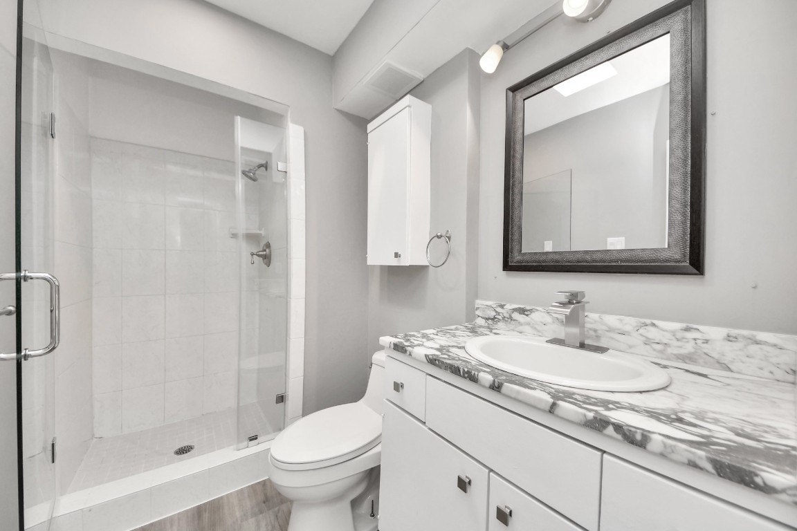 6311 Riverview Way Houston, TX 77057 - Photo 15 of 32 Secondary Bathroom with stand-up shower! Fully remodeled!