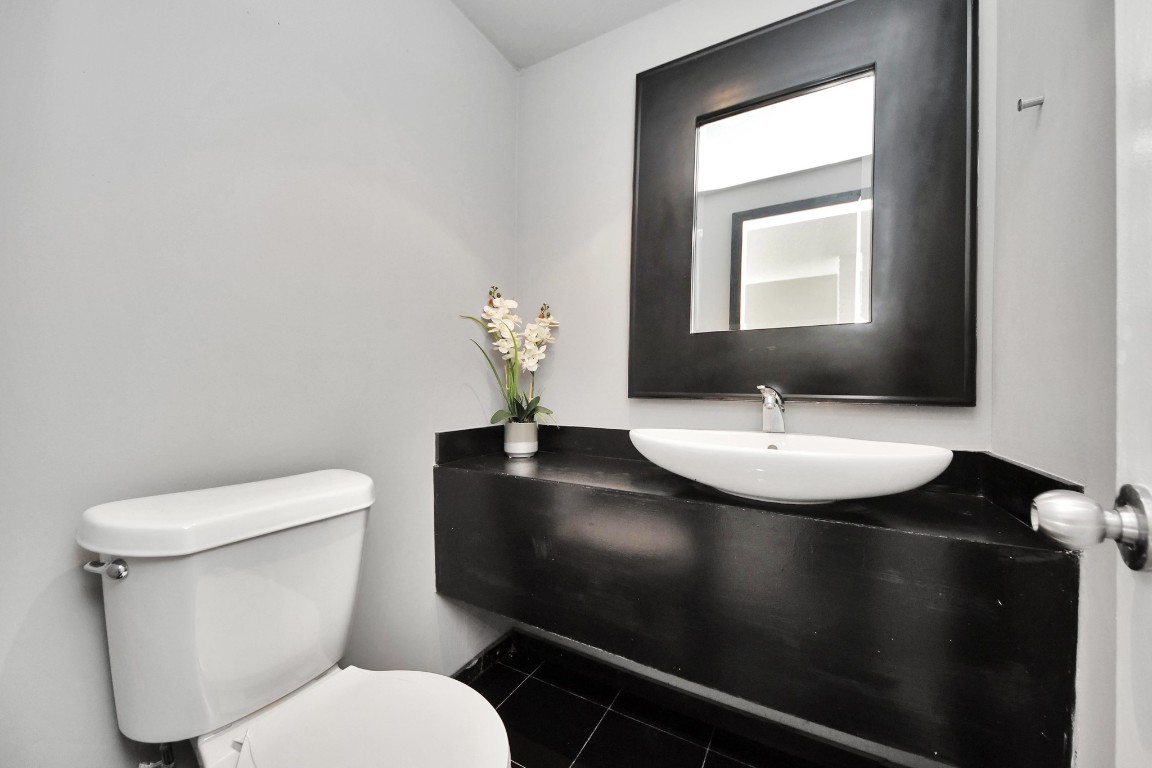 6311 Riverview Way Houston, TX 77057 - Photo 9 of 32 Half bath located downstairs!