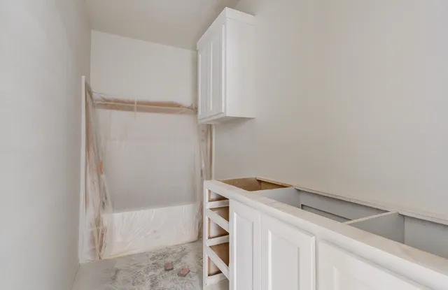 an empty room with windows