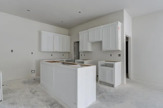 a view of a kitchen with sink and stove