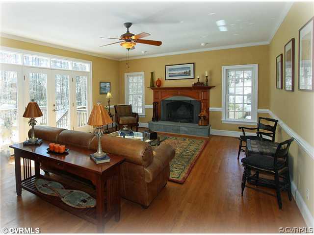 2720 Arrandell Road Midlothian, VA 23113 - Photo 5 of 17 a living room with furniture and a fireplace