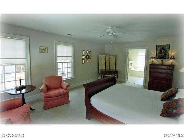 2720 Arrandell Road Midlothian, VA 23113 - Photo 8 of 17 a living room with furniture and a wooden floor
