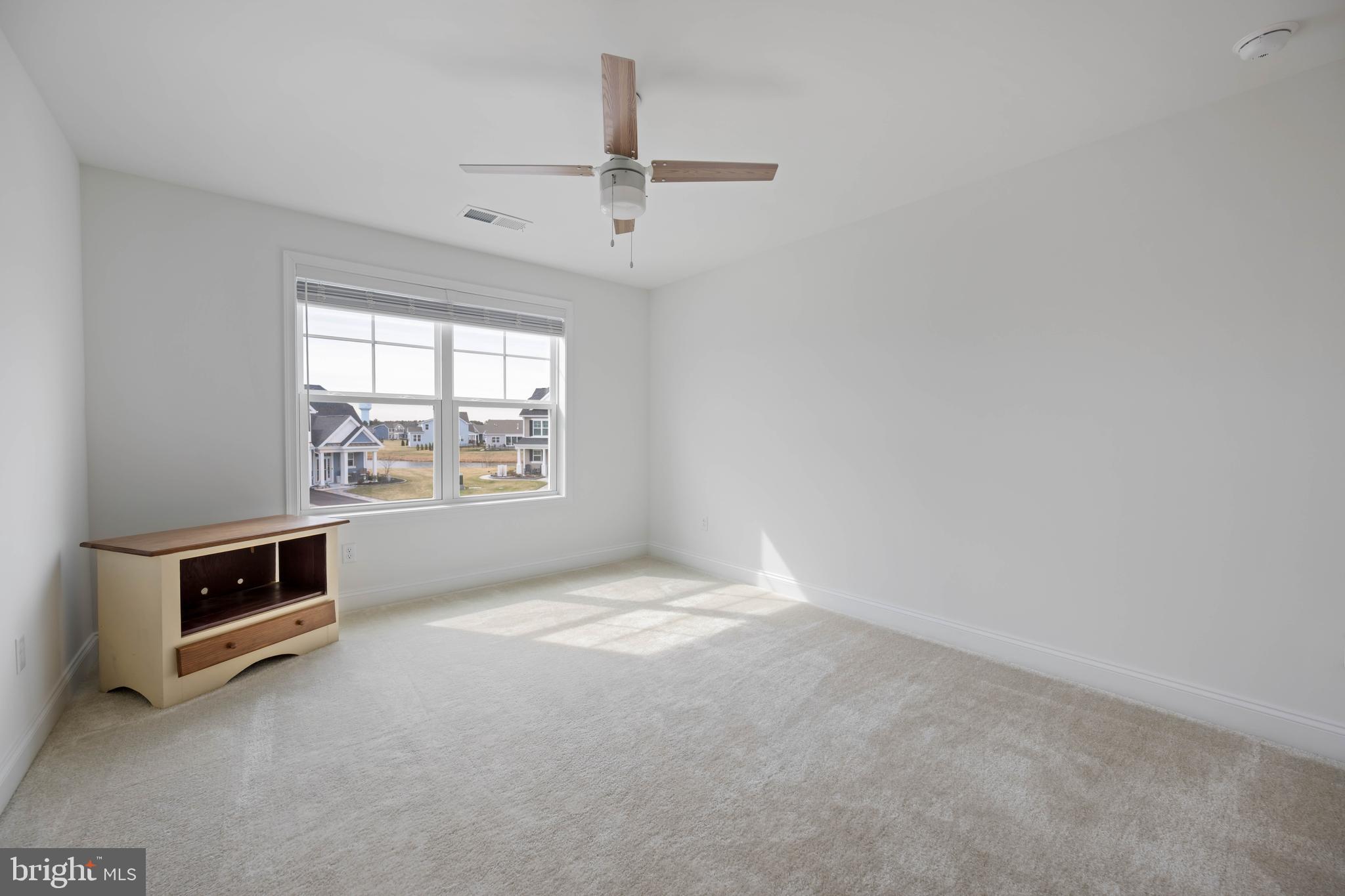 25304 Razorbill Court Millsboro, DE 19966 - Photo 20 of 45 an empty room with windows