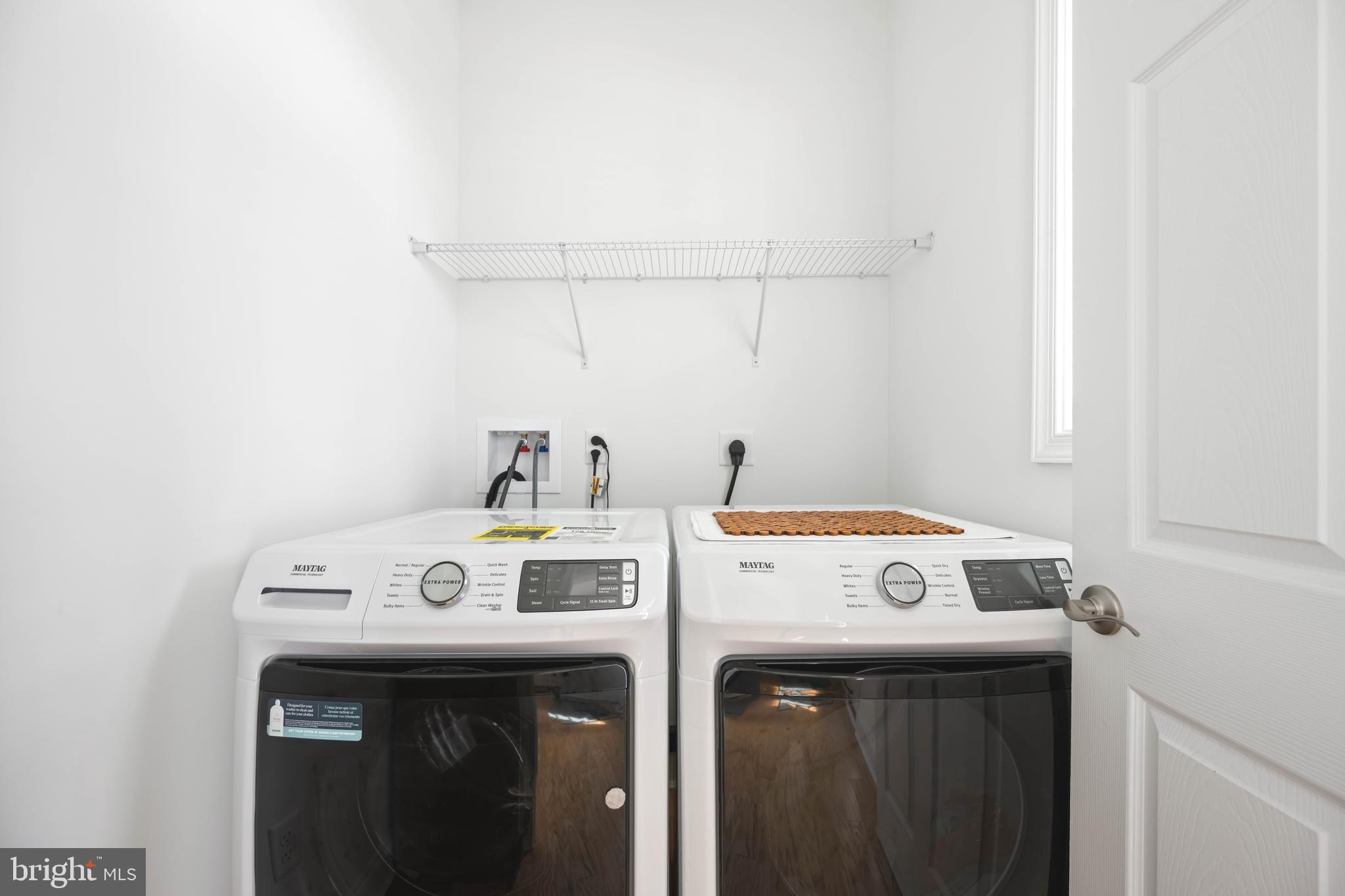 25304 Razorbill Court Millsboro, DE 19966 - Photo 24 of 45 a utility room with dryer and washer