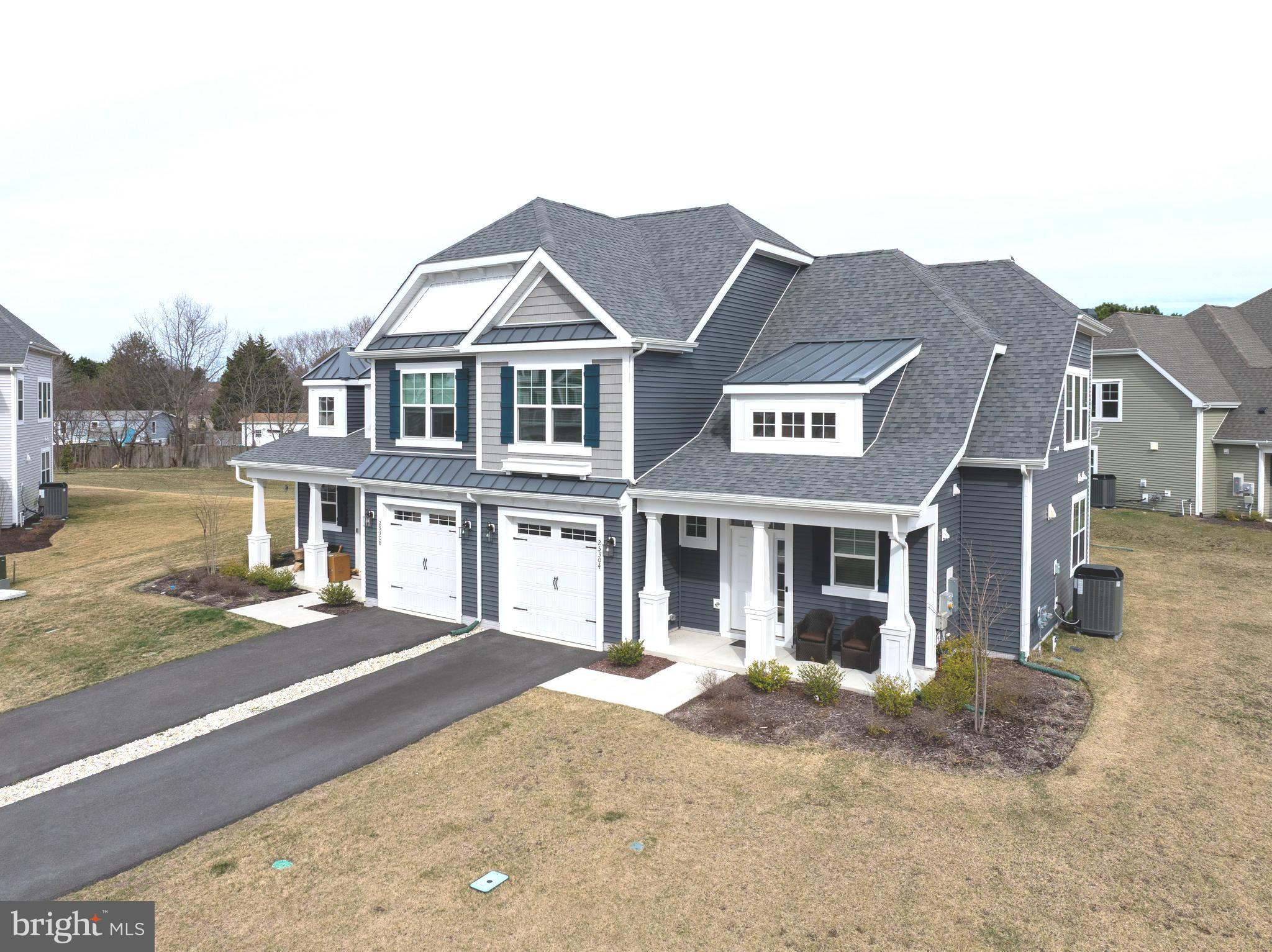 25304 Razorbill Court Millsboro, DE 19966 - Photo 27 of 45 a front view of a house with a yard
