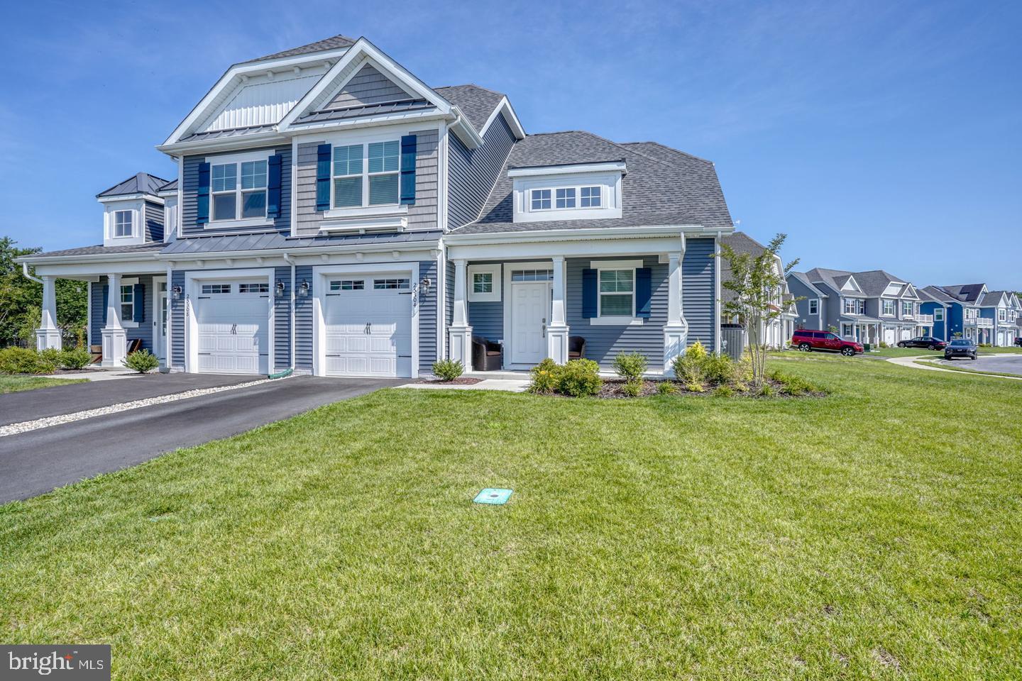 25304 Razorbill Court Millsboro, DE 19966 - Photo 45 of 45 a front view of a house with a yard