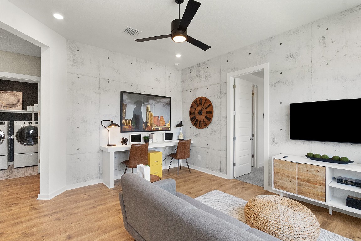 120 Pipe Cactus Pass Georgetown, TX 78633 - Photo 23 of 35 a living room with furniture and a flat screen tv
