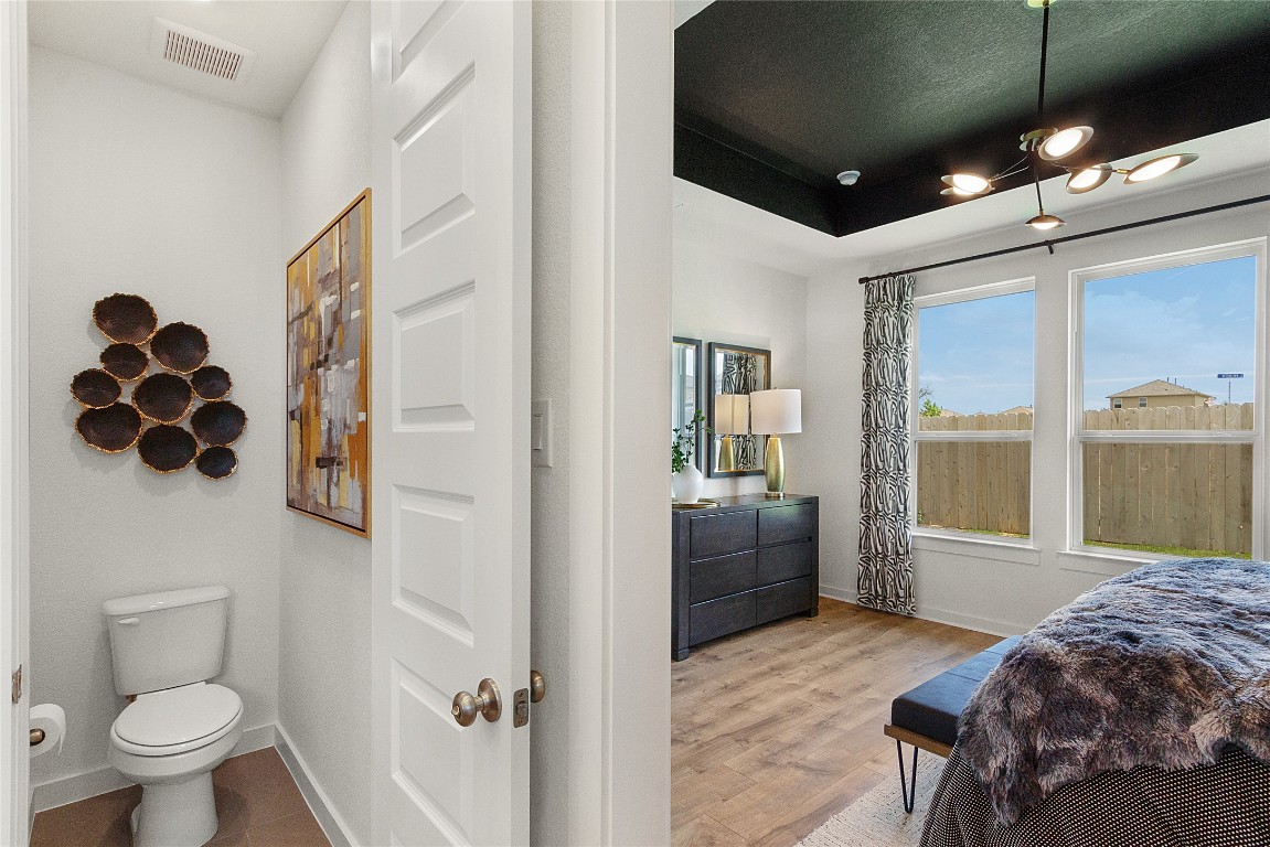 120 Pipe Cactus Pass Georgetown, TX 78633 - Photo 34 of 35 a bedroom with a large bed and a window