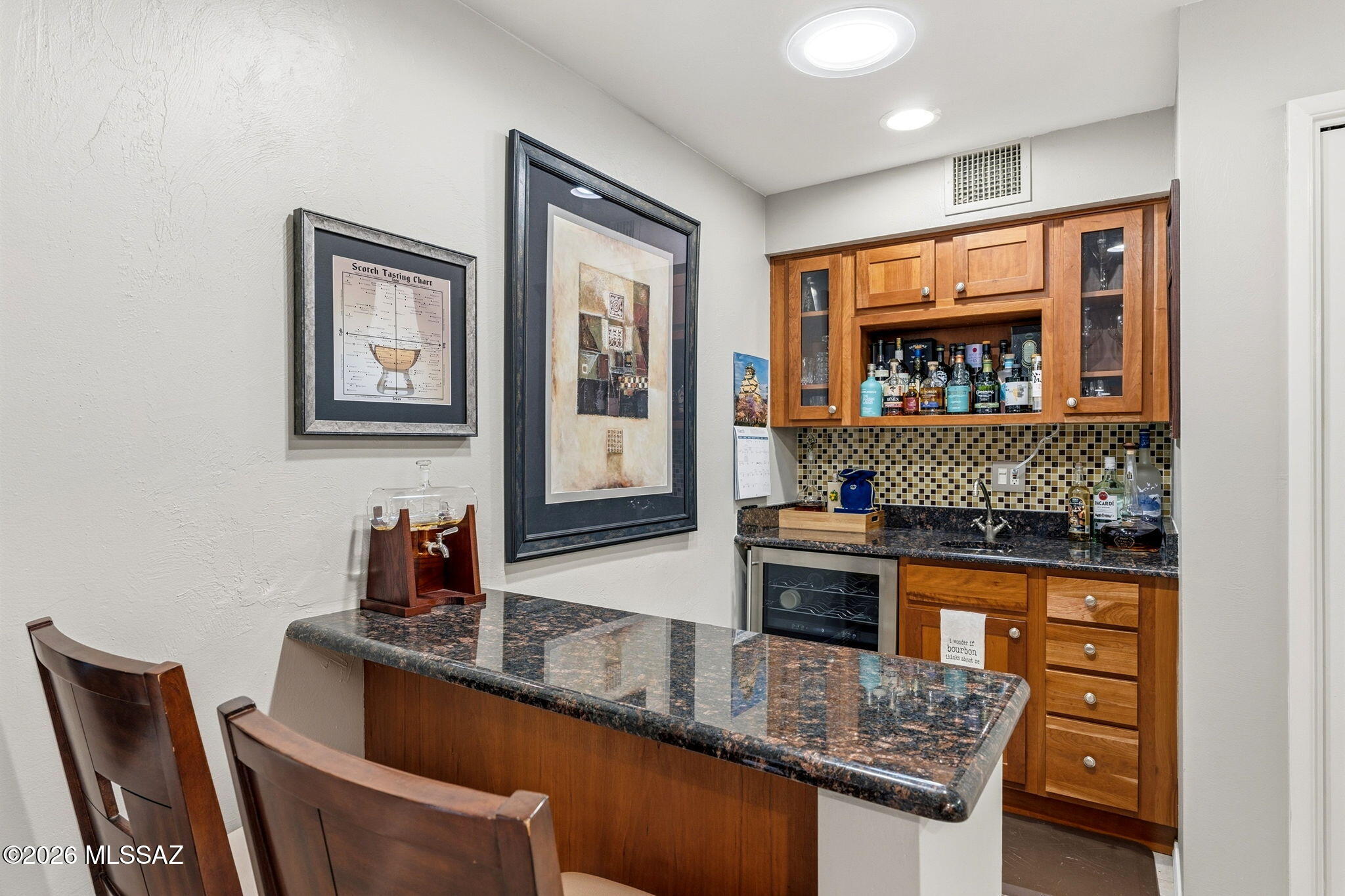 4641 North Rockcliff Road Tucson, AZ 85750 - Photo 19 of 48 Spirits Bar, with wine cooler, sink and seating for two