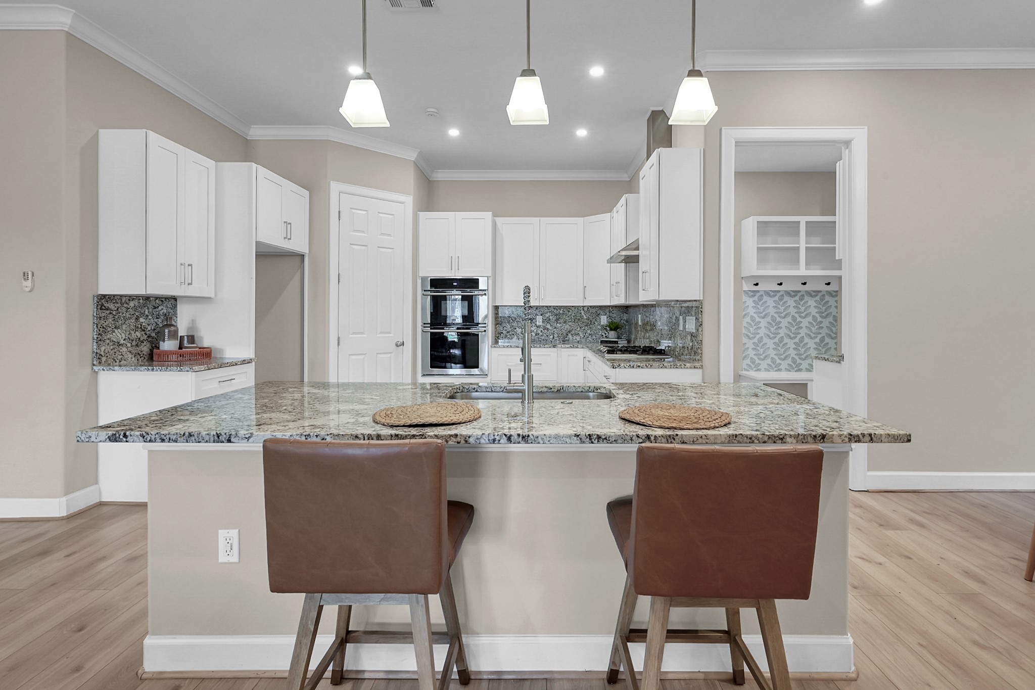121 Bermuda Circle Montgomery, TX 77356 - Photo 13 of 44 a kitchen with stainless steel appliances kitchen island granite countertop a sink and cabinets