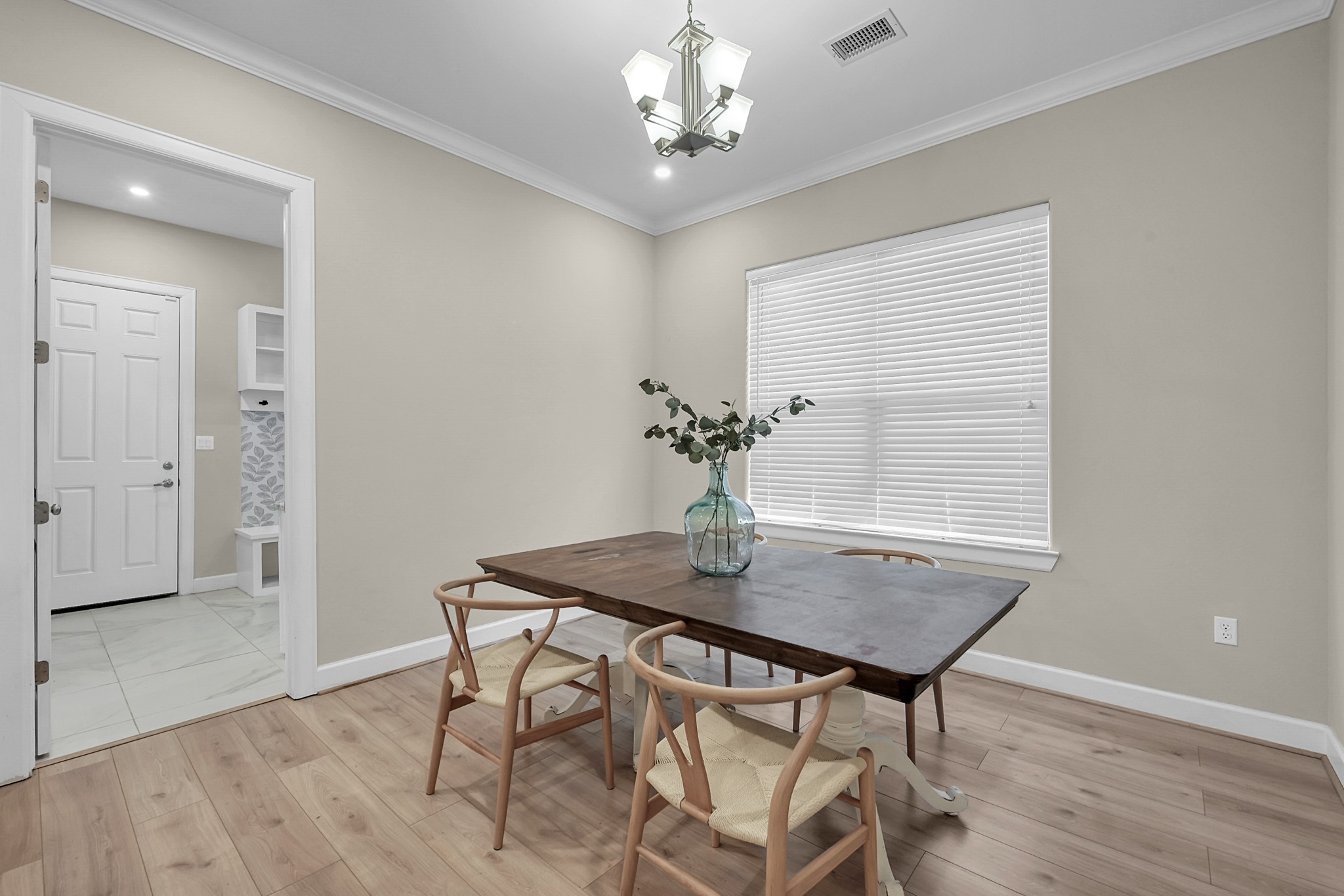 121 Bermuda Circle Montgomery, TX 77356 - Photo 18 of 44 a view of a dining room with furniture window and wooden floor
